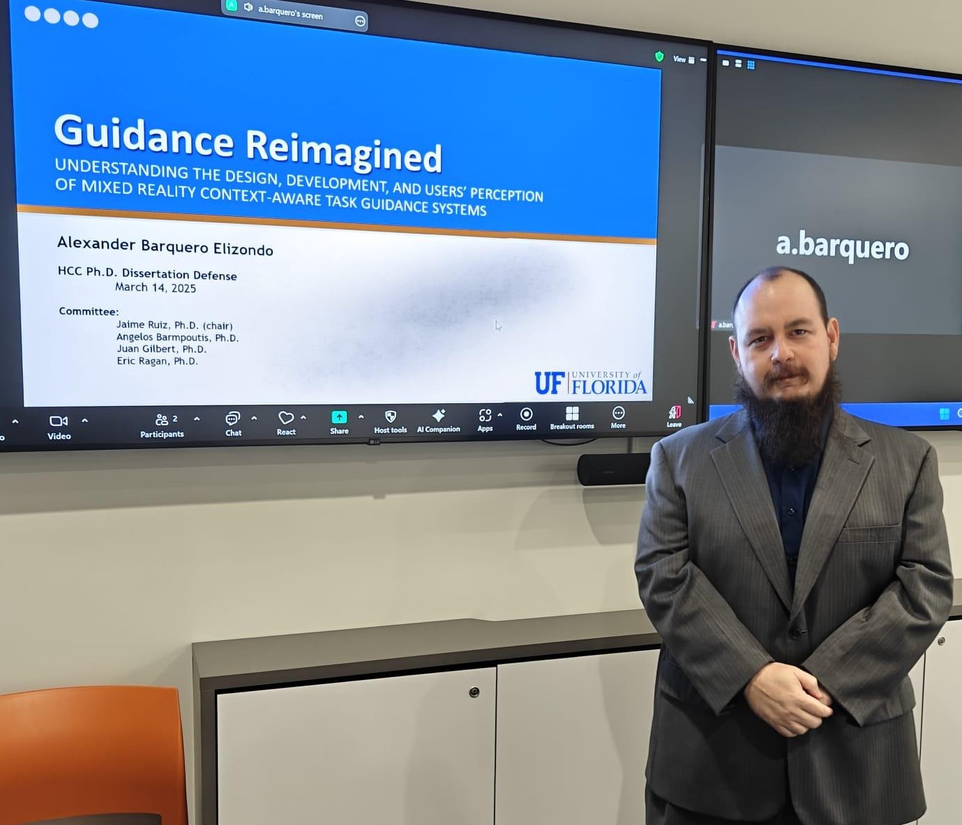 Alex Barquero standing in front of his presentation title screen.