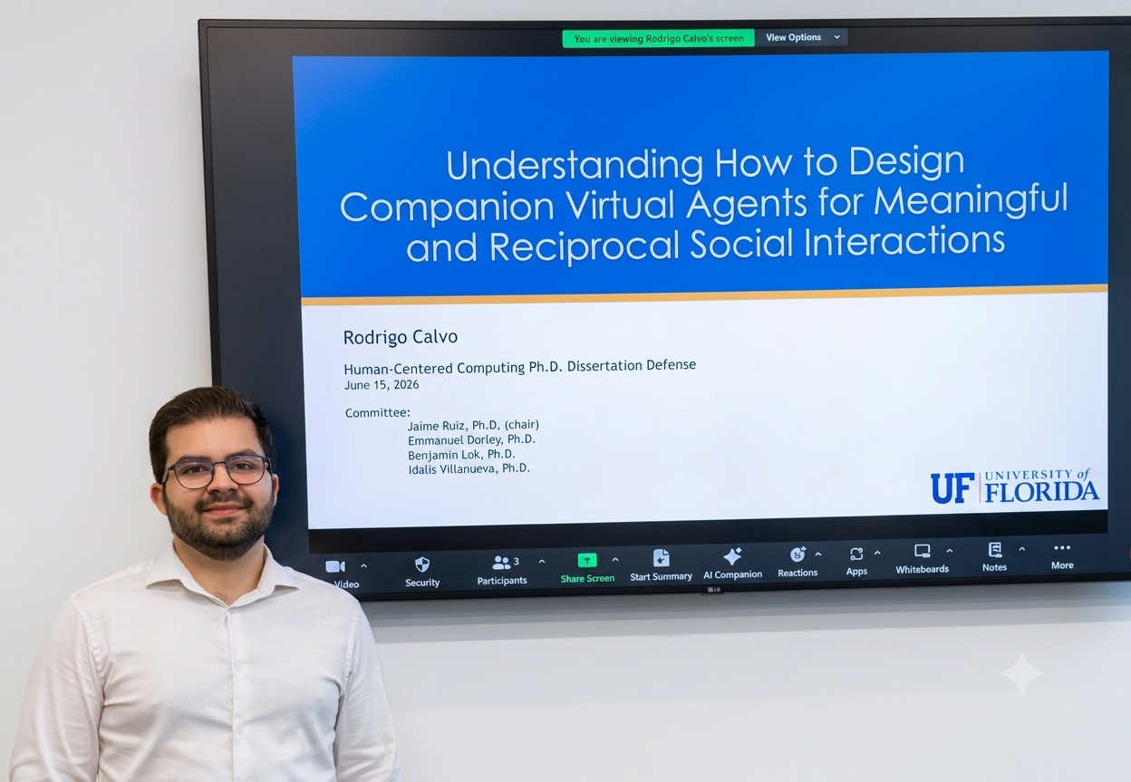 Picture of Rodrigo Calvo in front of his slides from his defense.